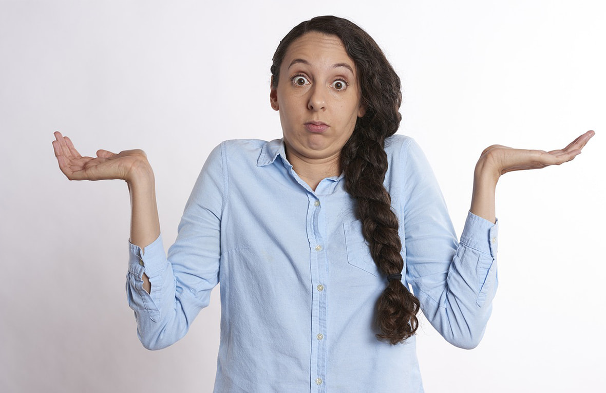 Woman with her hands up 