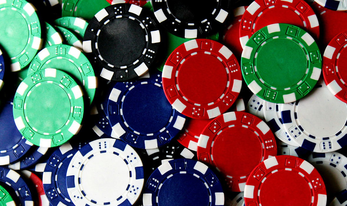 A Bunch of Casino Chips with Different Colors 