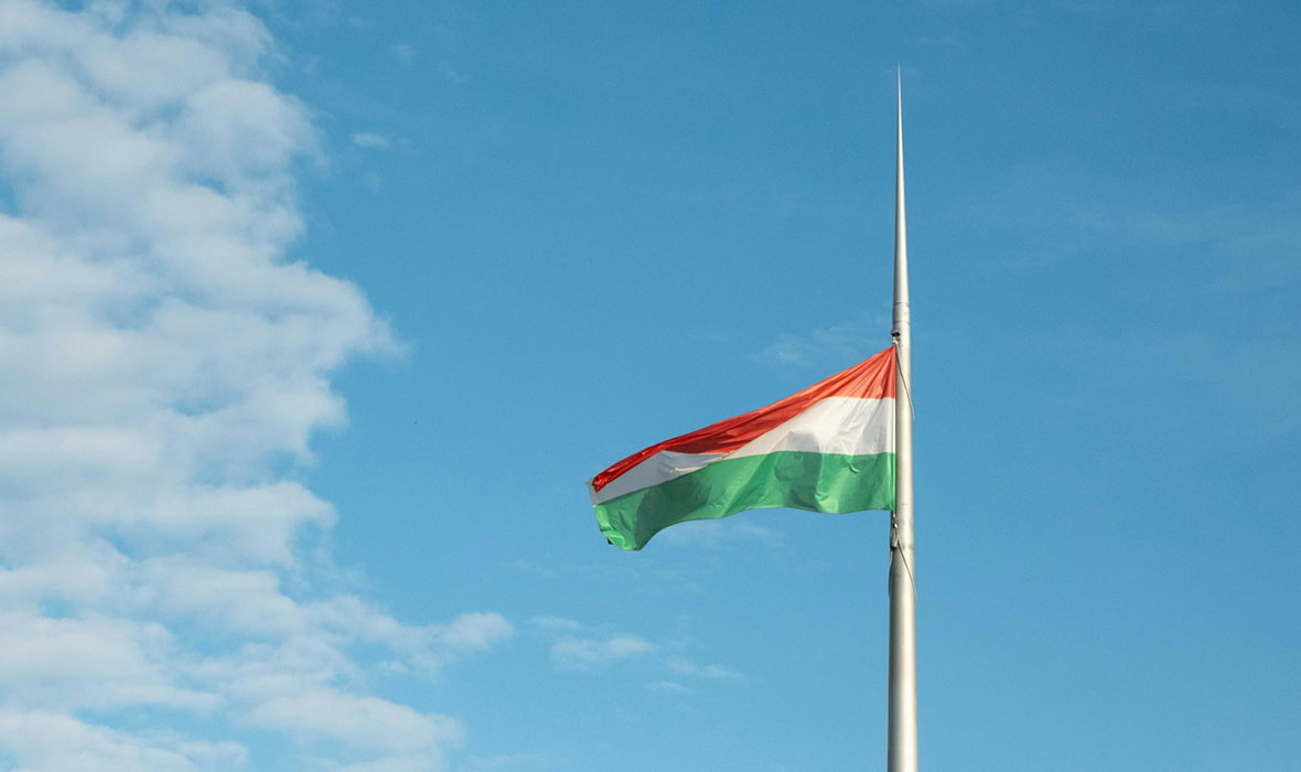 The Hungarian Flag Hanging on a Pillar 